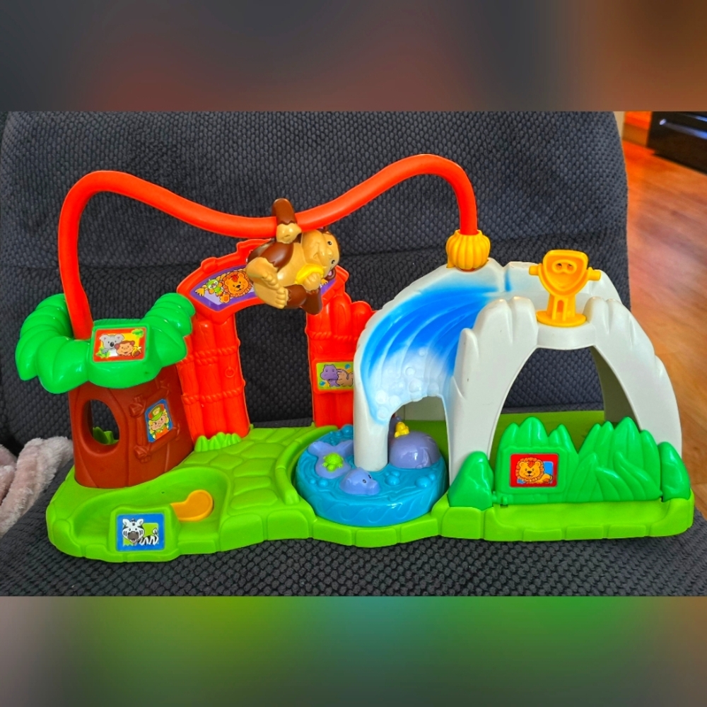 2007 FISHER PRICE LITTLE PEOPLE SURPRISE SOUNDS PEEK & PLAY ZOO
